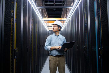  asian network engineer working in data center