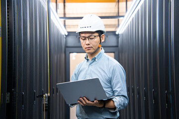  asian network engineer working in data center