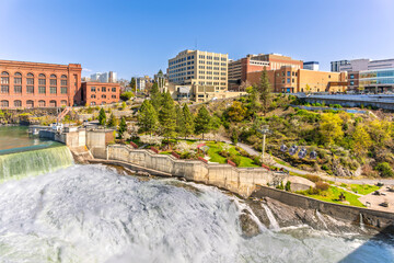 Huntington Park along the banks of the Spokane River and Monroe Street Bridge, at Spokane Falls, in downtown Spokane Washington State.