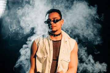 Obraz premium Freaky Clubber Man In Sunglasses Smiling, Stylish Guy Portrait In Neon Light