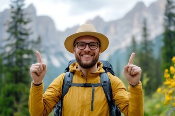 Obraz premium Happy hiker pointing up in mountains, adventure travel concept.