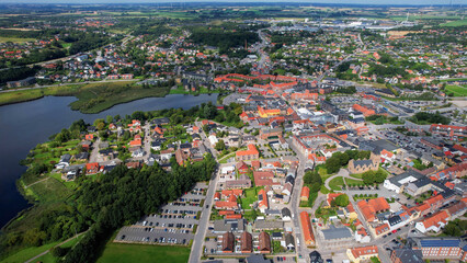 An arial panoramic view of the old town of the city Hobro in Denmark on a sunny spring day