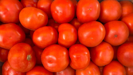 Close-up of fresh tomatoes, organic produce, healthy food concept.
