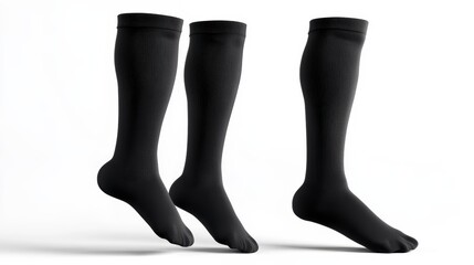 Pair of black knee-high compression socks isolated on white background.