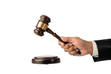 Hand Holding a Wooden Gavel Above a Sounding Block Against a Black Background in a Courtroom Setting hand