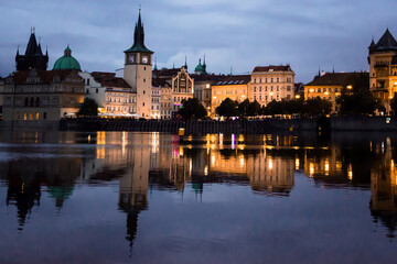 Night View of Prague Old Town with Reflections on Vltava River
