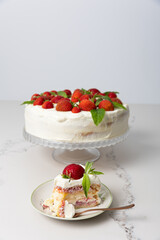A strawberry and mascarpone cream cake with lemon