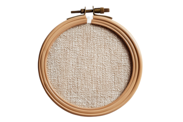 Embroidery hoop with fabric background showcasing textile art project details and crafting potential in a creative workspace