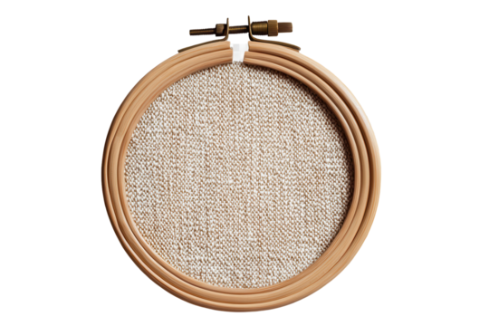 Embroidery hoop with fabric background showcasing textile art project details and crafting potential in a creative workspace