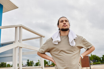 Focused young man training outdoors for athletic performance and fitness
