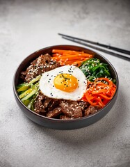 A bowl of Bibimbap with rice, sautéed vegetables, a fried egg, beef, and gochujang (Korean chili paste), garnished with sesame seeds. AI