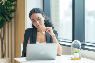 stress business woman working with laptop in the office,tired,work overload,problem,bored
