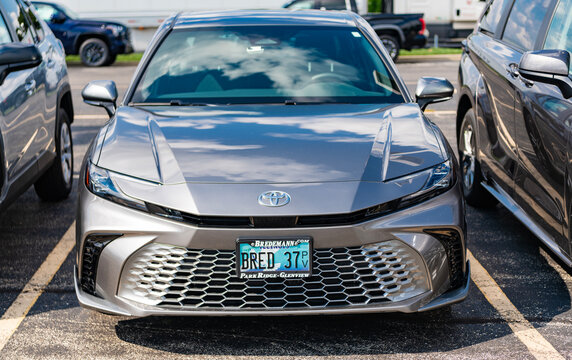 Park Ridge, Illinois, USA - August 16, 2024: 2025 Toyota Camry XSE Hybrid car. Luxury car of Toyota Camry hybrid type. Car of Toyota Camry XSE parked outdoor. Toyota Camry, corner view