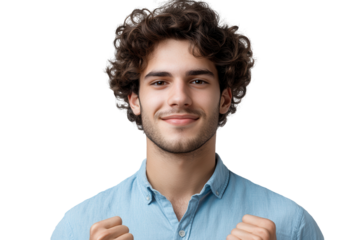 Charming young man with curly hair expresses joy and enthusiasm in a relaxed studio setting during a bright afternoon