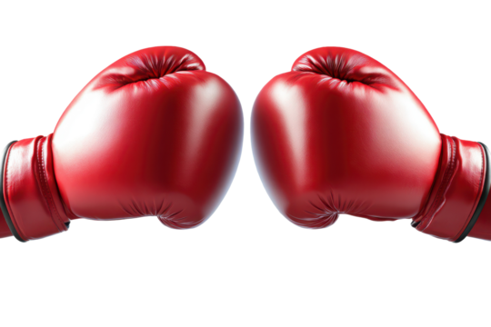 Red boxing gloves come together in a striking display of strength and precision during an intense boxing match at a local gym in the evening hours