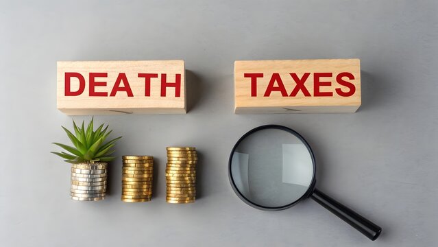 Death taxes concept. Wooden blocks with inscription and coins. Taxes that are applied when someone dies, usually on the money or property they leave behind. 