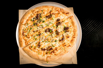 Pizza topped with Korean beef