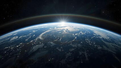 Fototapeta premium Earth's Dawn: An awe-inspiring view from space, capturing the moment the sun's first light graces our planet's surface, set against the vast canvas of the cosmos.