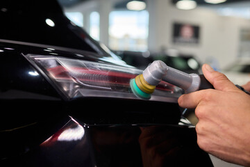 A Detailed Close Up of the Car Polishing Process in the Field of Automotive Detailing