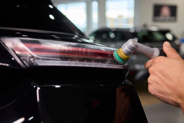 A Detailed Close Up of the Car Polishing Process in the Field of Automotive Detailing