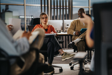 Business team engaged in a collaborative meeting at a modern office