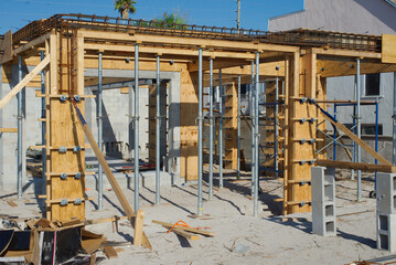 Modern Construction Framework with Wooden Beams and Steel Supports on Sunny Day in Florida....