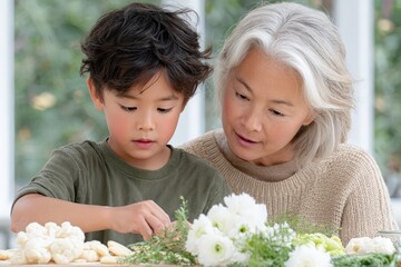 Asian grandmother and child baking cookies together at home