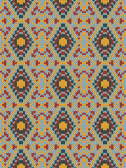 Knitted seamless pattern embroidery tribal native.Traditional Aztec,Navajo,Southwest and Mexican style.Sweater crochet vector geometric background.Design for fabric,clothing,wrapping,print,decoration.