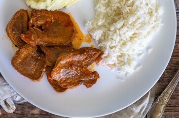 Classic rustic Brazilian food, beef tongue with rice and mashed potatoes. Real food