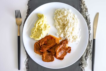 Classic rustic Brazilian food, beef tongue with rice and mashed potatoes. Real food