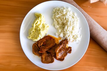 Classic rustic Brazilian food, beef tongue with rice and mashed potatoes. Real food