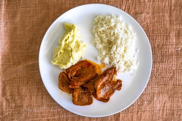 Classic rustic Brazilian food, beef tongue with rice and mashed potatoes. Real food