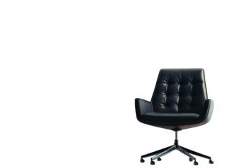 Sleek black office chair prominently featured against a calming green wall showcasing a modern work environment