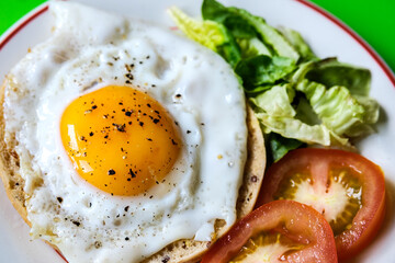 Healthy Fried Egg With Sllced Tomato And Lettuce