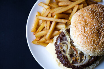 Homemade Beef Or Hamburger On Cheese With Chips Or Frites