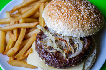 Homemade Beef Or Hamburger On Cheese With Chips Or Frites