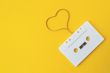 White cassette tape with a heart drawn around it