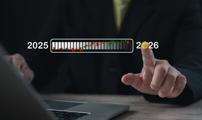 Person pointing to a digital chart timeline from 2025 to 2026, symbolizing strategic forecasting, business growth, financial planning, investment direction, and performance tracking over time.