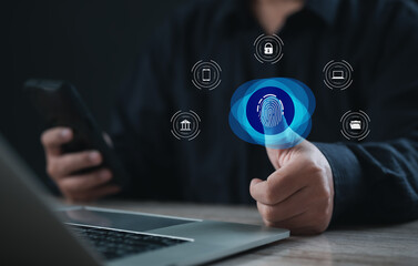 Businessman using thumbprint scan for secure authentication, with virtual fingerprint icon and...
