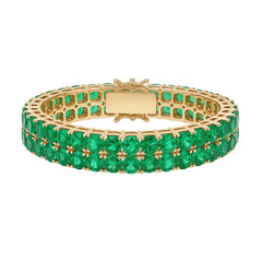 Elegant gold bracelet adorned with vibrant green gemstones, showcasing luxury and style