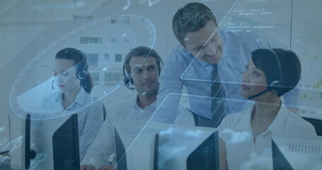 Colleagues wearing shirts collaborating at monitors using headsets in office, with code overlays