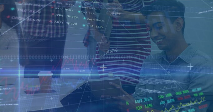 Leaning team reviewing tablet screen at modern office desk, with floating financial graphs