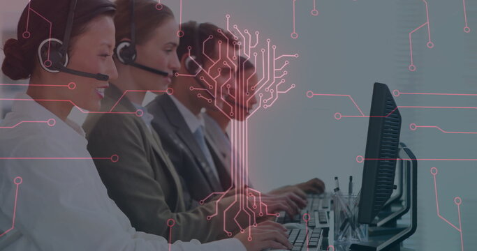 Handling calls using headsets and typing on computers at office desk under digital circuit overlay