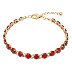 Obraz premium Elegant gold bracelet adorned with red gemstones, displayed on a soft fabric background
