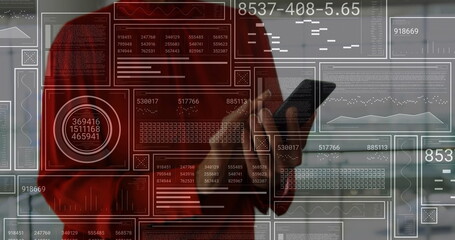 Holding smartphone businesswoman in red blazer viewing digital HUD panels in office, business theme