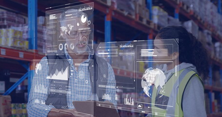 In warehouse, workers discussing data analytics on digital interface with image