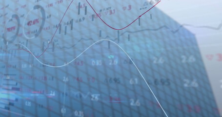 Graphs and charts with financial data on grid-patterned background in image
