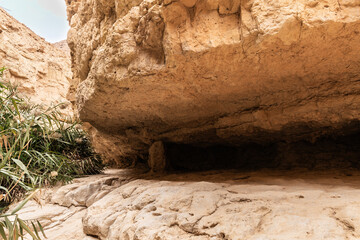 Natural  passage in mountain as result of corrosion in Arugot mountain Stream Nature Reserve near Dead Sea in southern Israel