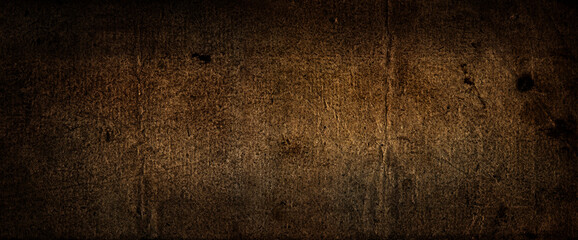 Old wide daark background paper, rough texture for design paper background. Brown color wallpaper. Ancient paper of the 18th century.