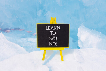 Learn to say no symbol. Concept words phrase Learn to say no on beautiful black blackboard....